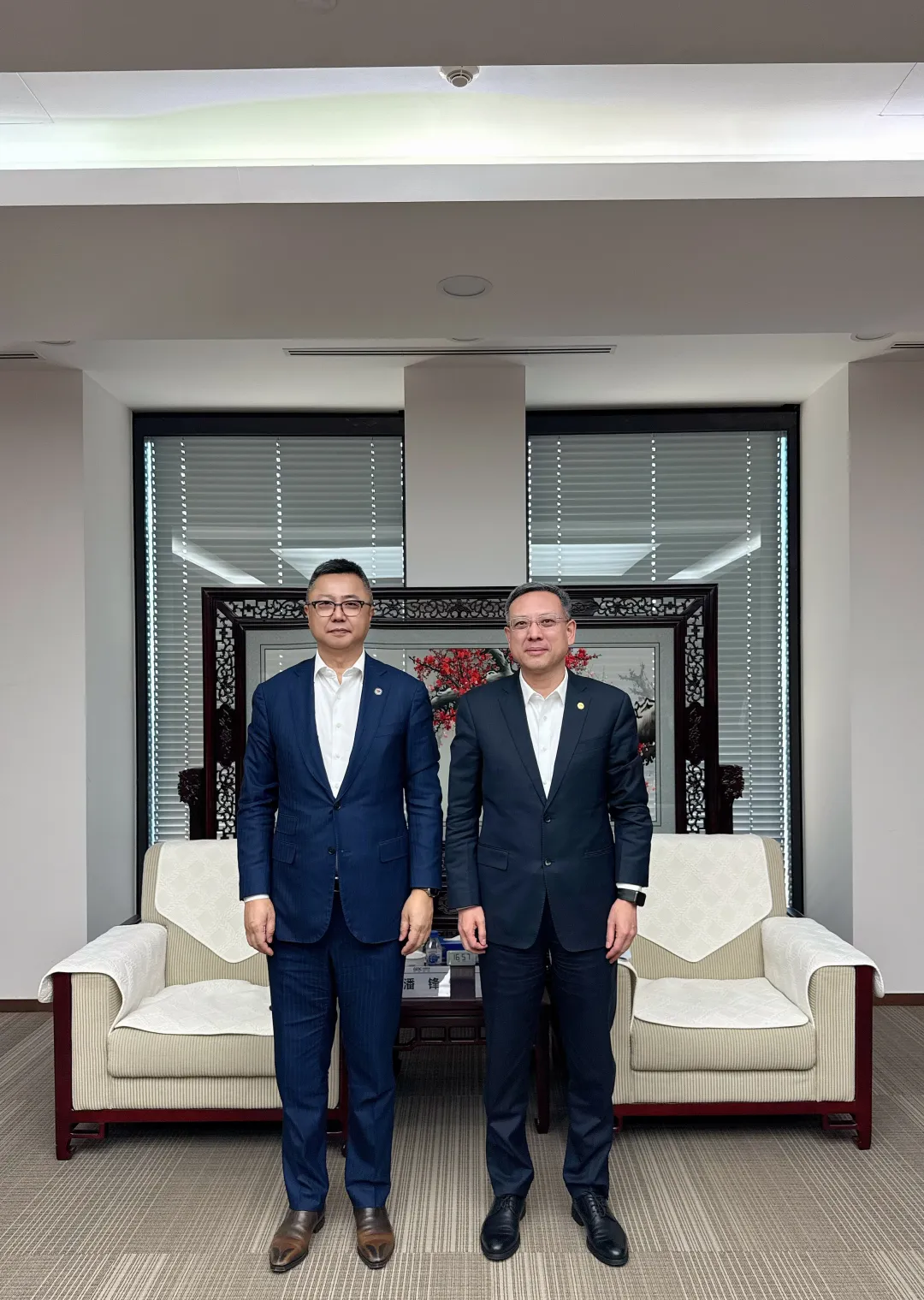 潘锋与中国能建总经理倪真工作座谈 